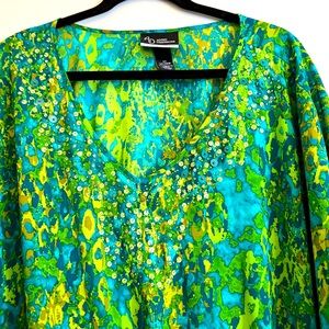 Sheer green and aqua tunic that ties at the waist.